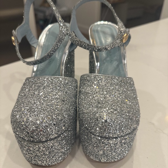 Butter Shoes - Chara Ferragni Silver Sparkle Platform Shoes
MJ wedge